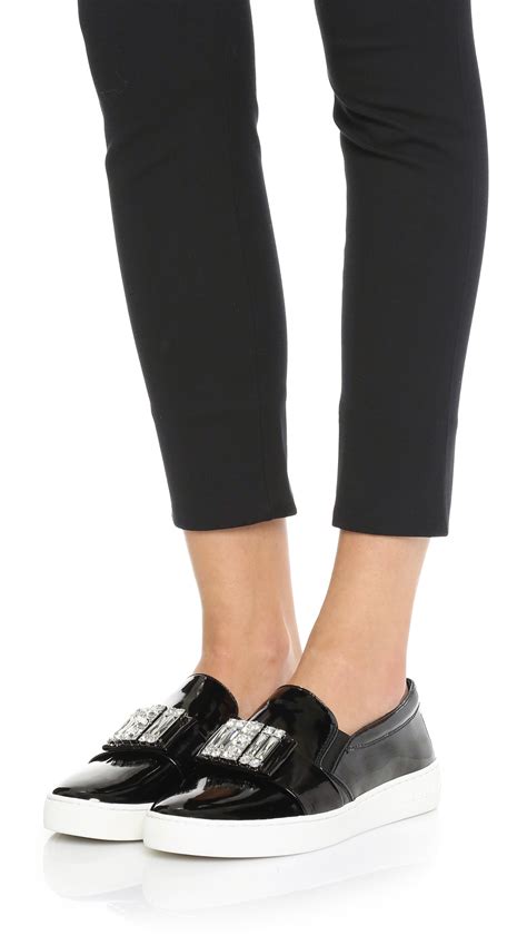 michael kors sneaker black|michael kors black slip on.